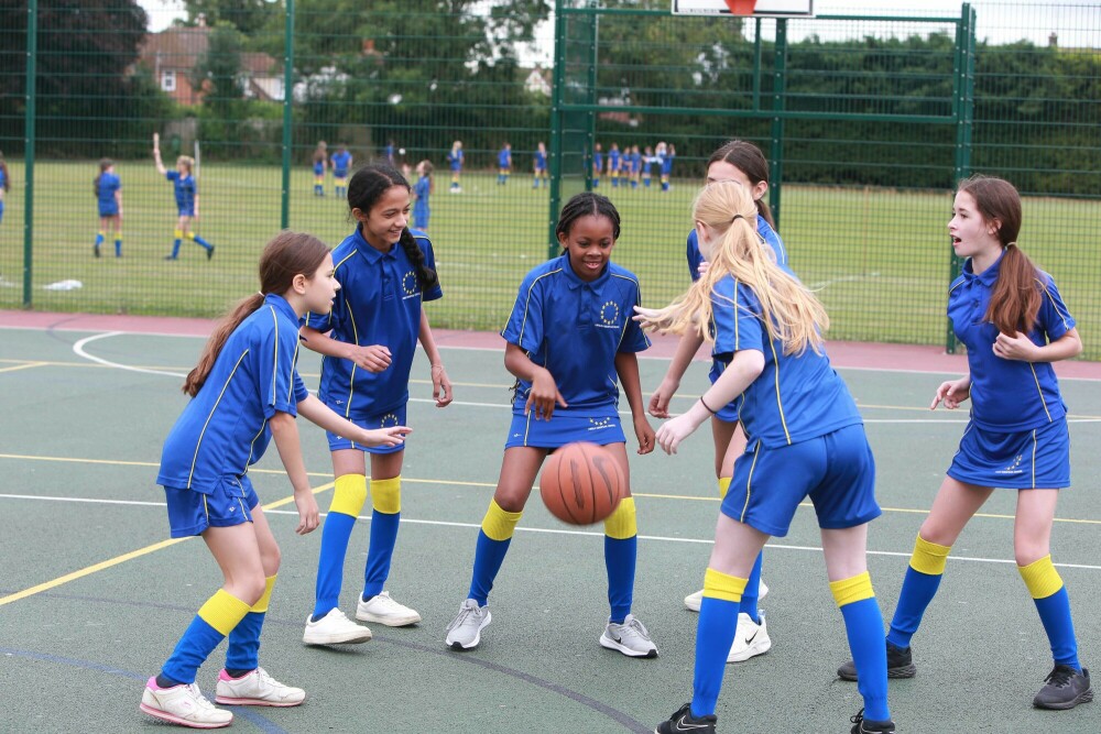 Girls playing basketball 